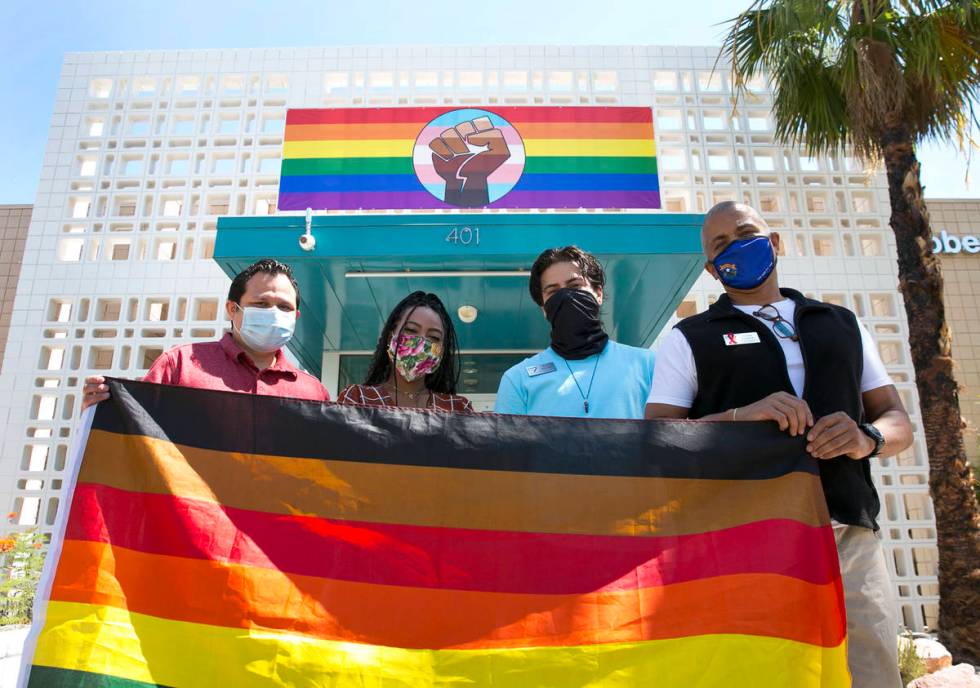 Vince Collins, right, director of Operations at The Gay and Lesbian Community Center of Souther ...