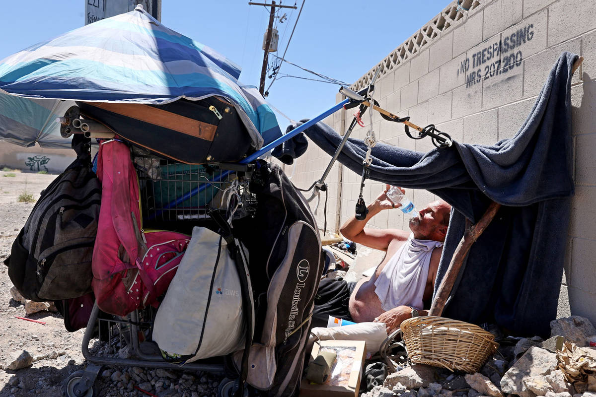 Eric Michael Wynn, 53, at his camp after getting water in the front office at SHARE Village, fo ...