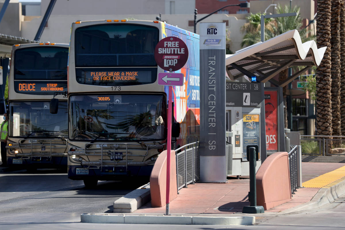 People board a Regional Transportation Commission bus at a stop on Casino Center Boulevard at G ...