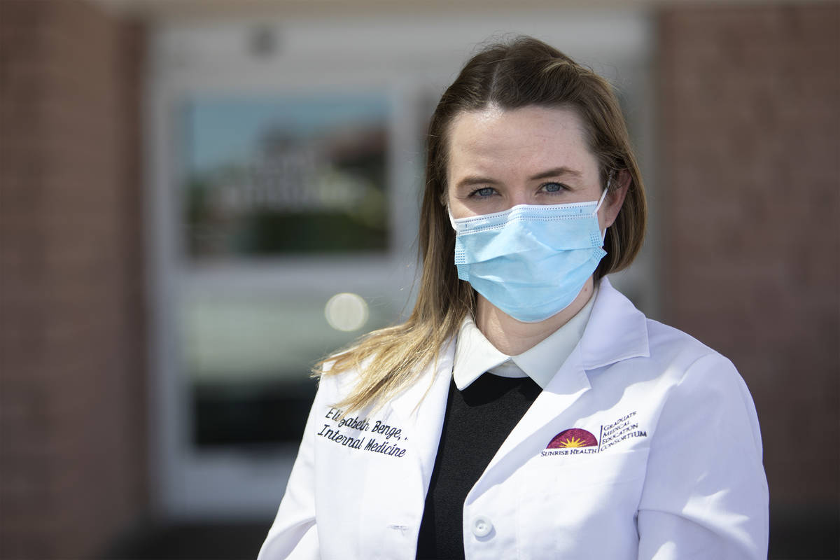 Dr. Elizabeth Benge, a graduate of St. George's University medical school, stands for a portrai ...