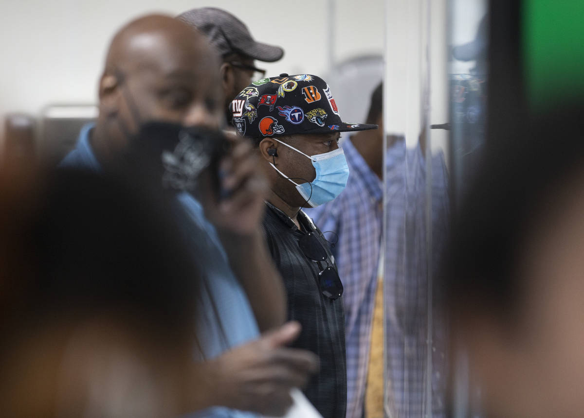 Customers wait in line to order at Mario's Westside Market on Wednesday, June 17, 2020, in Las ...
