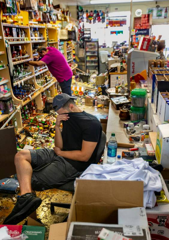 Ziad Abdullatif of the Eastridge Market liquor store is tired but still helping to run the fami ...