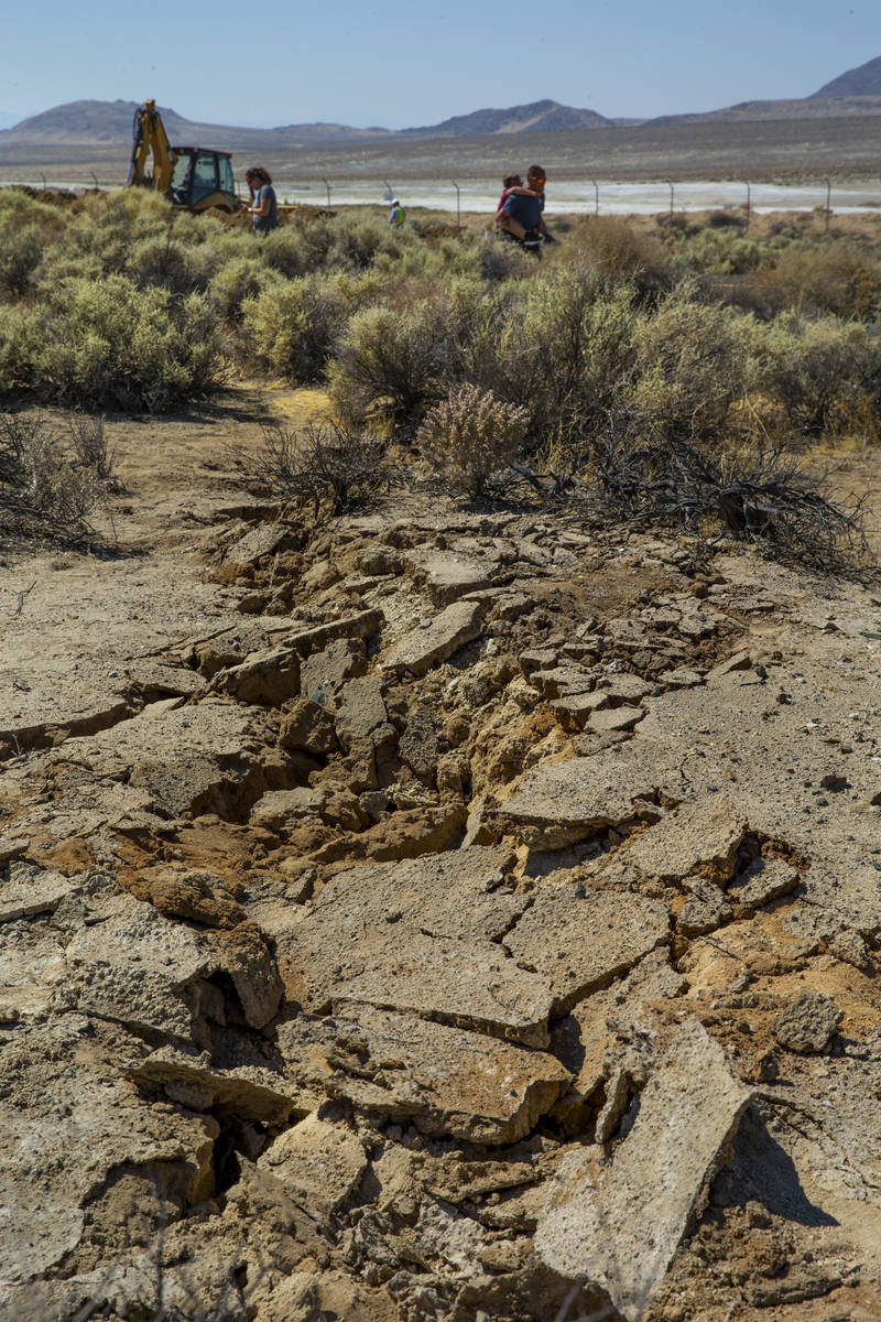 Extensive cracks in the desert are coupled with shifting pavement and open cracks due to the ea ...