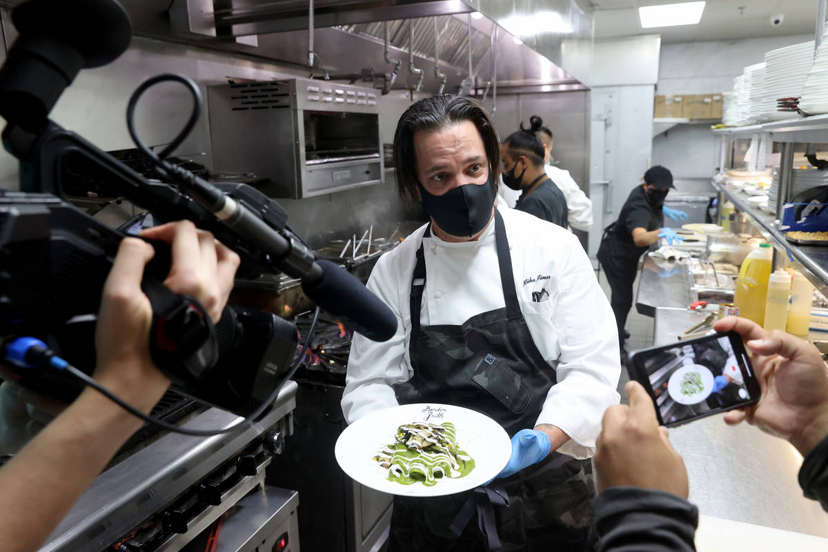 Border Grill Executive Chef Mike Minor makes Chicken Poblano Enchiladas at Mandalay Bay on the ...