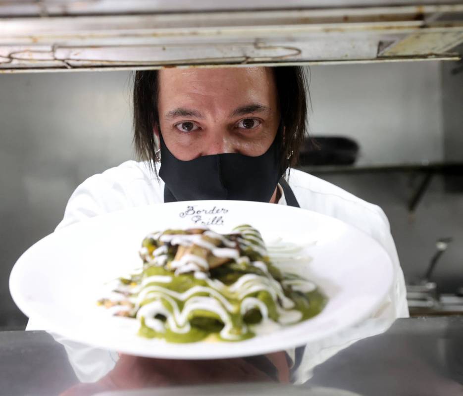 Border Grill Executive Chef Mike Minor makes Chicken Poblano Enchiladas at Mandalay Bay on the ...