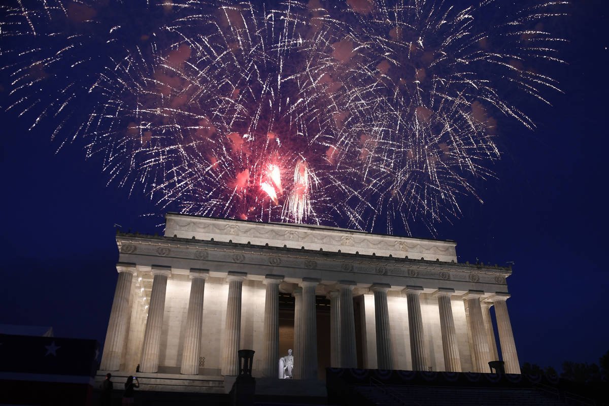 FILE - In this July 4, 2019 file photo, fireworks go off over the Lincoln Memorial in Washingto ...