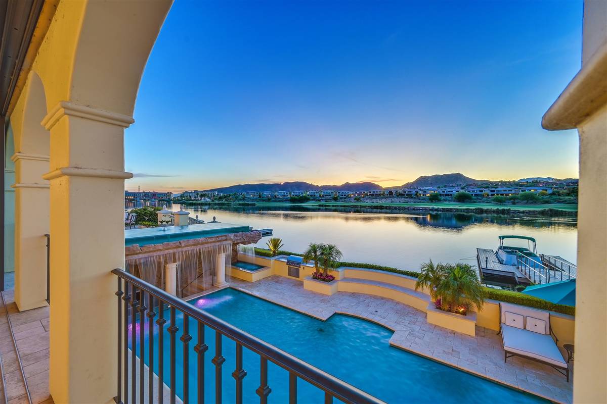 Luxurious Real Estate The three-level home at SouthShore Country Club has sweeping views of Lak ...