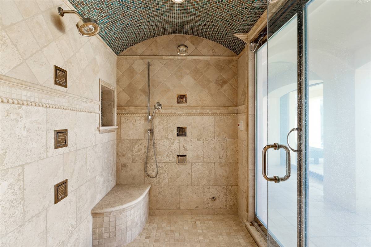 Shower in guest bath. (Luxurious Real Estate)