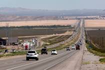 Traffic moves on Interstate 15 in California, seven miles south of Primm, near the Nipton Road ...