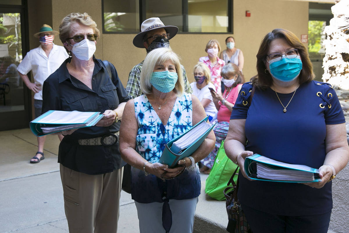 People who oppose the AHL Arena in Henderson, including Carolyn Jones, left, Jeani Adams and La ...