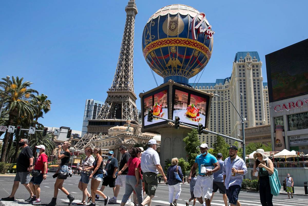 Picture/Photo: Man and woman standing on plaza inside Paris casino