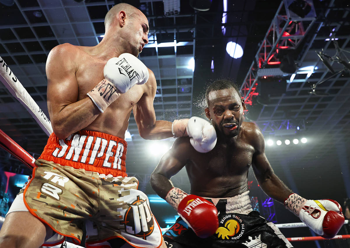 Jose Pedraza punches Mikkel LesPierre during their junior lightweight fight Thursday night at t ...