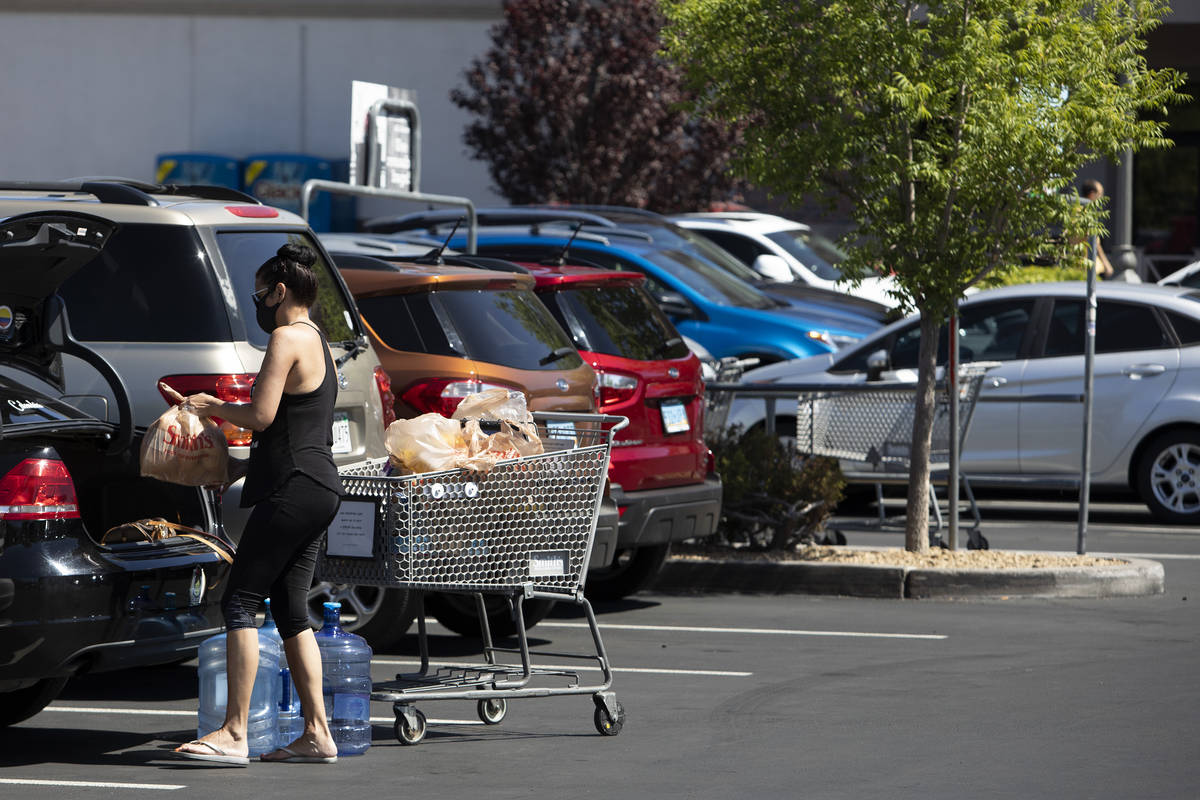 Carmen Barbasso loads her car with groceries at the Smith's Food & Drug on West Charleston ...