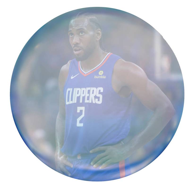 Los Angeles Clippers' Kawhi Leonard looks at the scoreboard during the first half of the team's ...