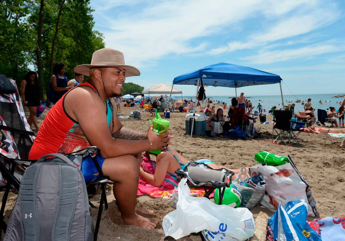 Jomar Gomez, 25, of Jamestown, N.Y., spends time for the July Fourth weekend at Beach 6, Presqu ...