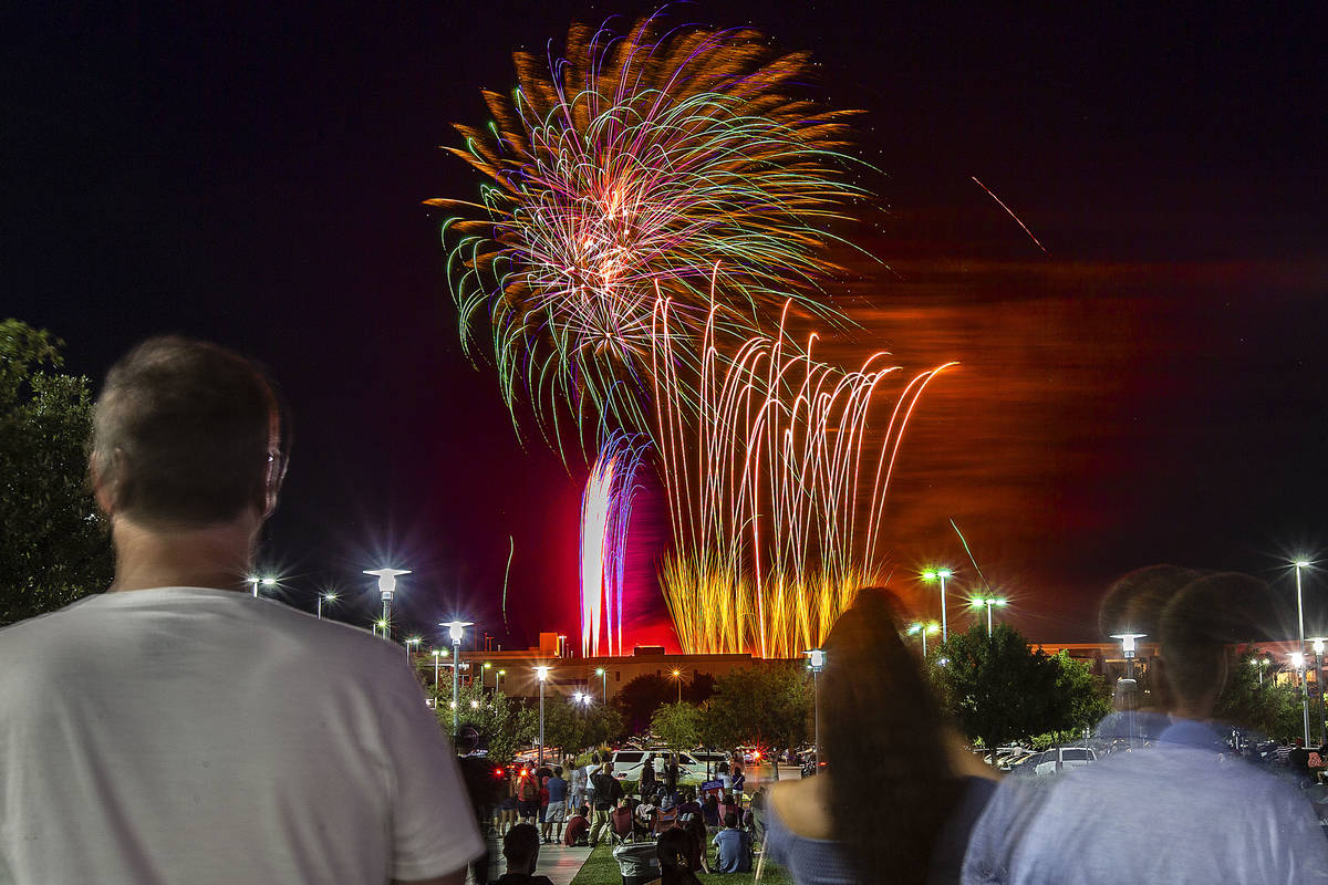 People watch the Red Rock Casino fireworks show from Downtown Summerlin on Saturday, July 4, 2 ...