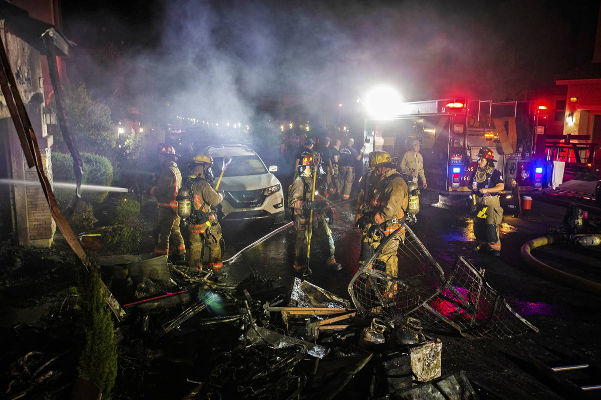 Fire fighters respond to a structure fire suspected to be caused by fireworks at 10758 Red Badg ...