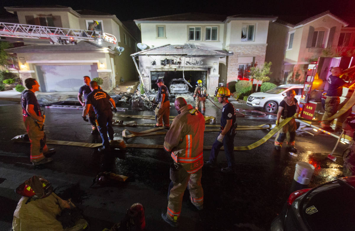 Fire fighters respond to a structure fire suspected to be caused by fireworks at 10758 Red Badg ...