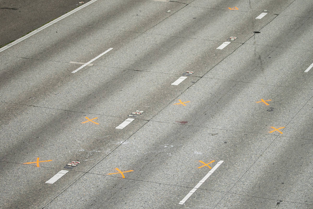 Two women were struck and critically injured where orange evidence markers are seen when a car ...