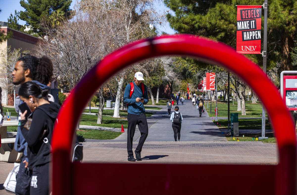 Students walk about the UNLV campus on Tuesday, March 3, 2020 in Las Vegas. (L.E. Baskow/Las V ...