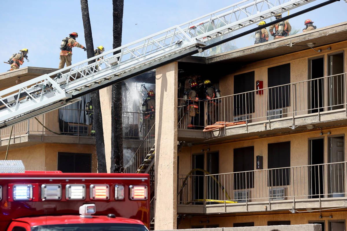 Las Vegas and Clark County firefighters battle a fire at Siegel Suites at 700 Las Vegas Blvd. N ...