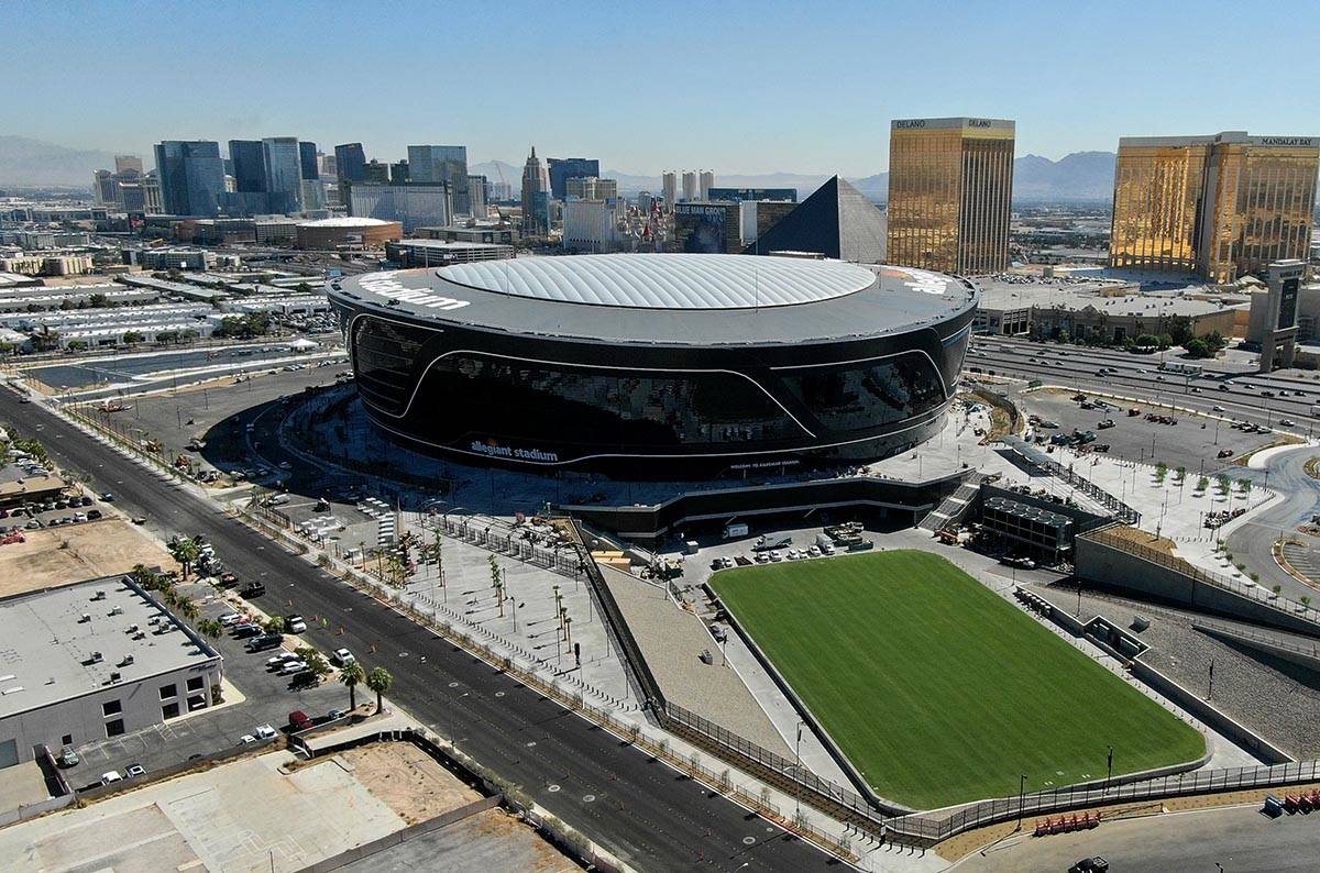 Allegiant Stadium roof signs illuminated Las Vegas ReviewJournal