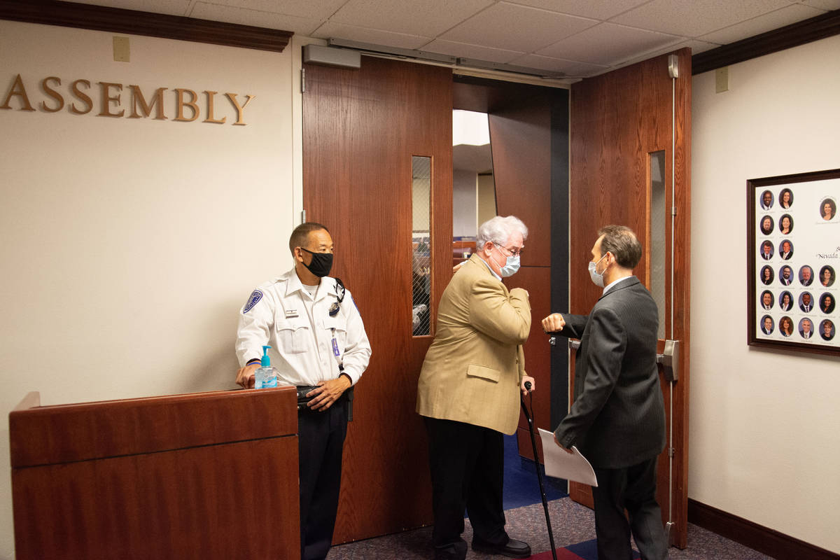 Nevada Assemblyman, John Hambrick greets a colleague outside of the Assembly chambers on the fi ...