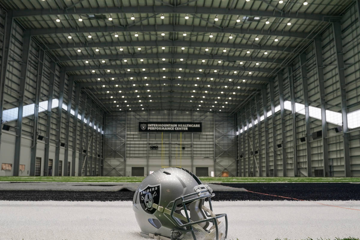 A Raiders helmet sits in one of the end zones in the field house of their Intermountain Healthc ...