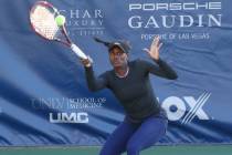 Asia Muhammad returns the ball as she and her partner Maria Sanchez face Manon Arcangioli and S ...
