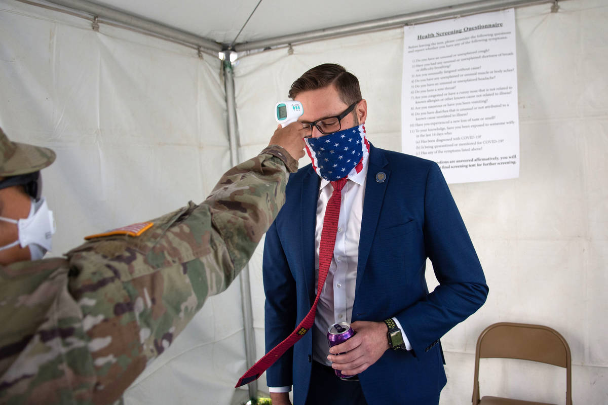Nevada Assemblyman, Gregory Hafen II gets his temperature checked before the first day of the 3 ...