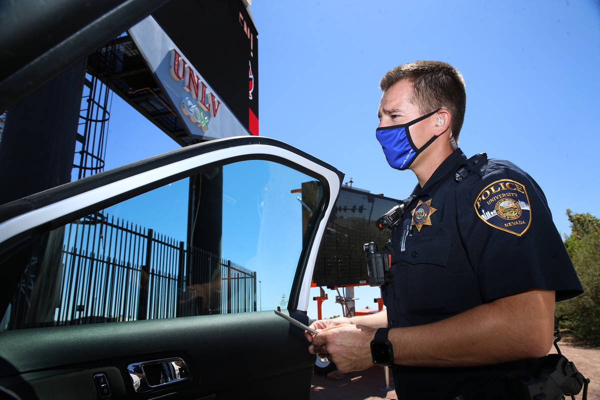 University Police Department officer Ryan Willman conducts a traffic stop on University Center ...