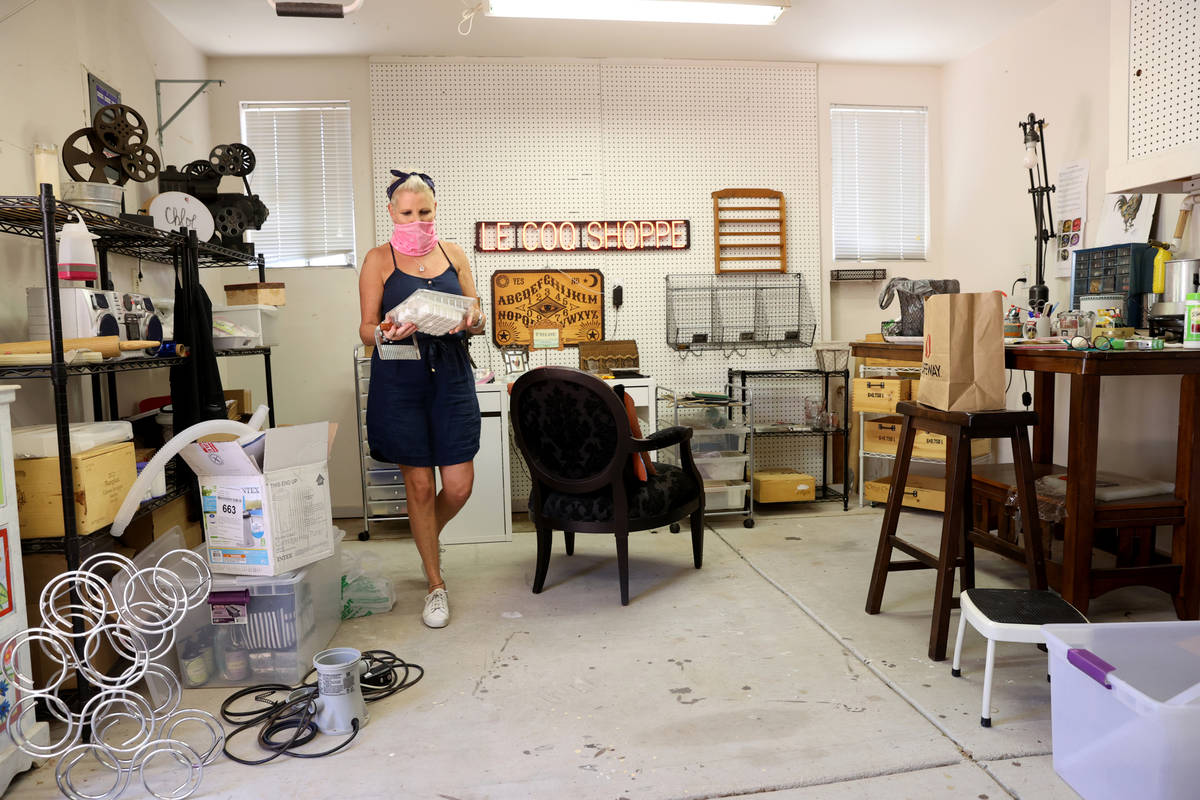 Susan Marsian-Bolduc packs her belongings in the workshop of her Las Vegas home Thursday, July ...