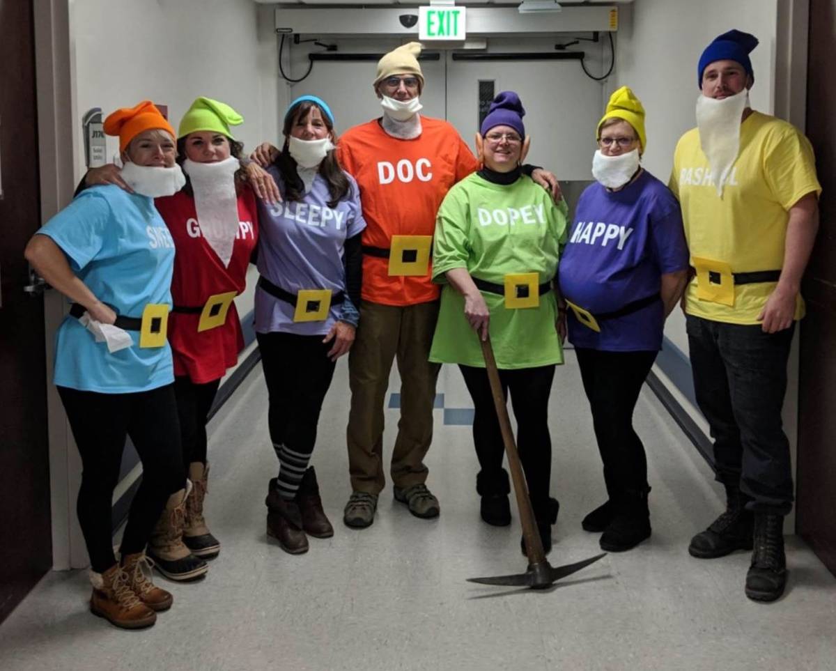 Vianna Thompson, 52, dressed as Dopey for Halloween 2019, with her coworkers. Thompson, an Army ...
