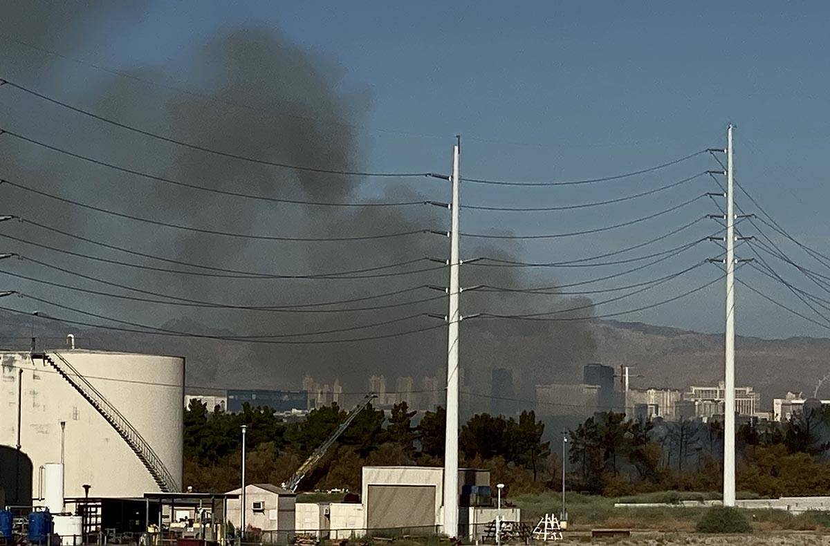 Clark County firefighters were called to a brush fire in east Las Vegas near Royal Links Golf C ...