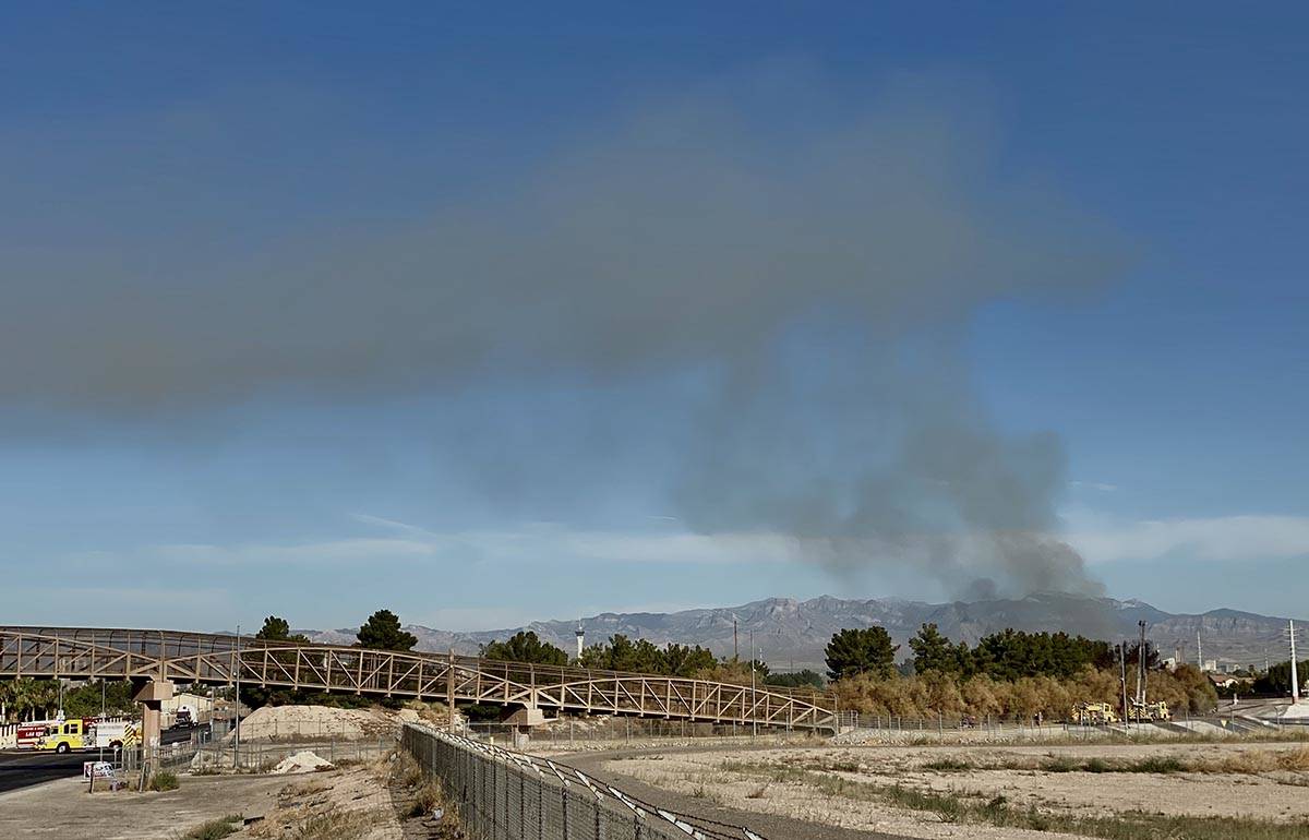 Clark County firefighters were called to a brush fire in east Las Vegas near Royal Links Golf C ...