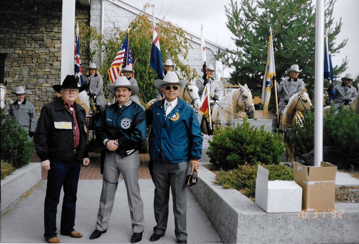 John H. Robinson, left, pictured in front of a ceremonial posse during a Nevada Day Parade in t ...