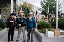 John H. Robinson, left, pictured in front of a ceremonial posse during a Nevada Day Parade in t ...