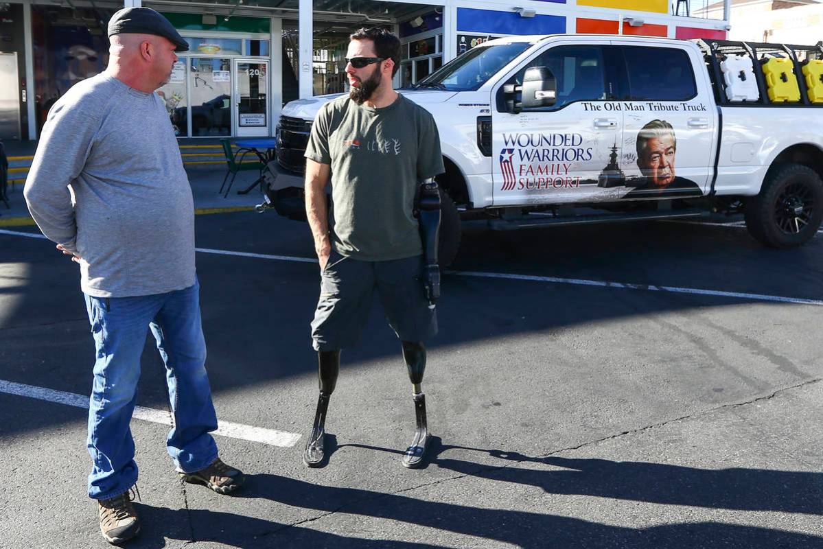 Rick Harrison, left, talks with Navy veteran and Purple Heart recipient Andrew Bottrell, who wa ...