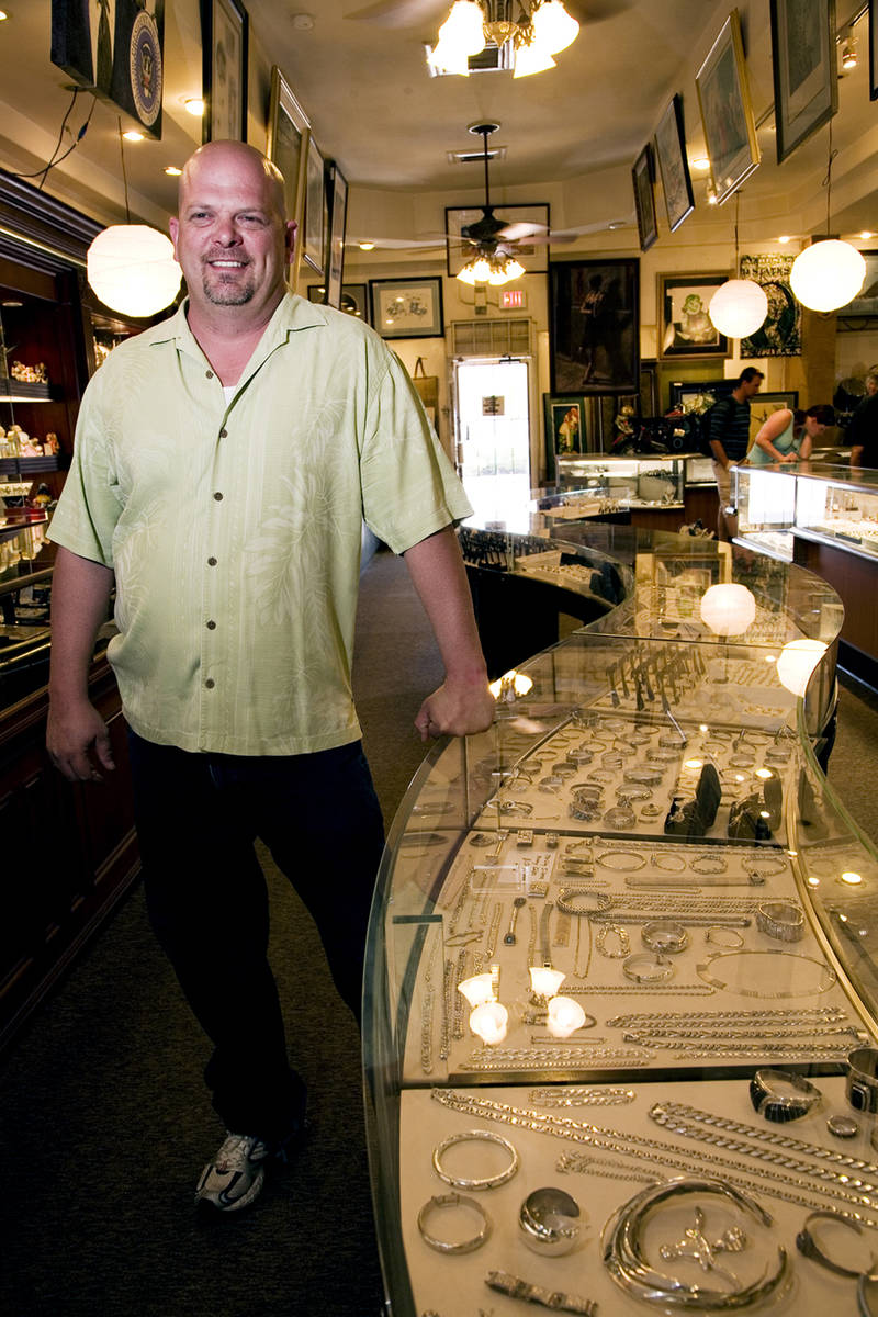 JEFERSON APPLEGATE/BUSINESS PRESS Rick Harrison standing at one of the many jewelry display co ...