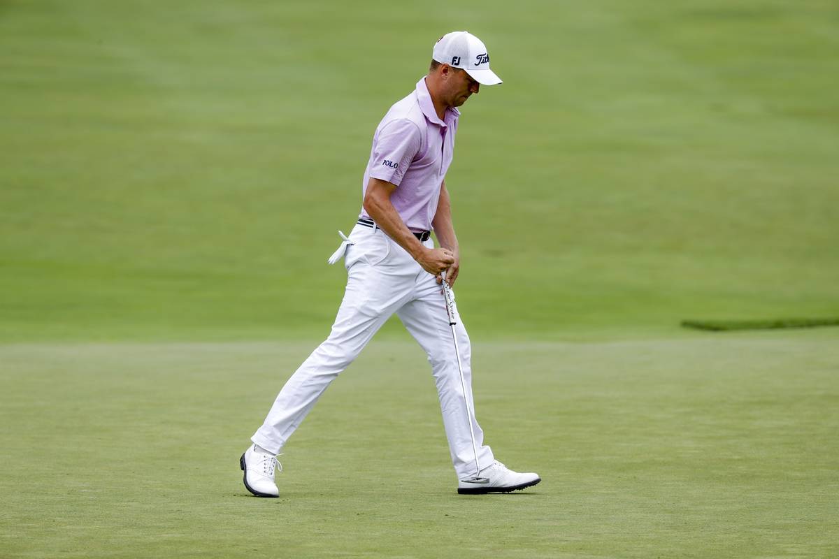 Justin Thomas reacts to his putt on the 13th hole during the final round of the Workday Charity ...