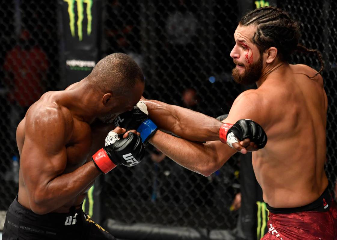 (R-L) Jorge Masvidal punches Kamaru Usman of Nigeria in their UFC welterweight championship fig ...