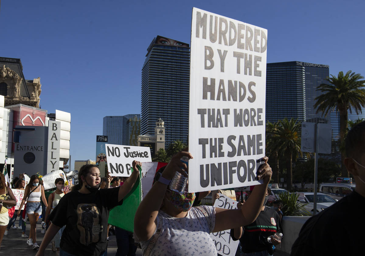 A protest for Vanessa Guillen moves down Las Vegas Boulevard on Sunday, July 12, 2020, on the L ...
