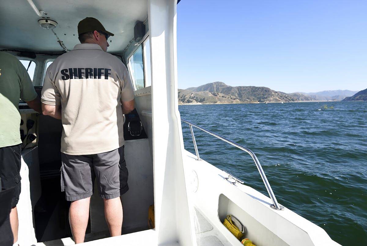 Sgt. Carl Patterson, of the Ventura County Sheriff's Department, continues the search for missi ...
