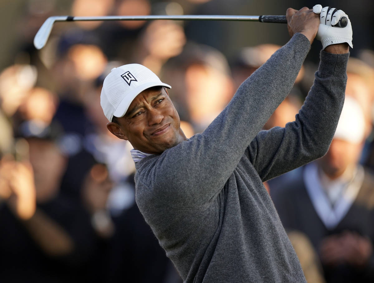 FILE - In this Feb. 14, 2020, file photo, Tiger Woods tees off on the 10th hole during the seco ...