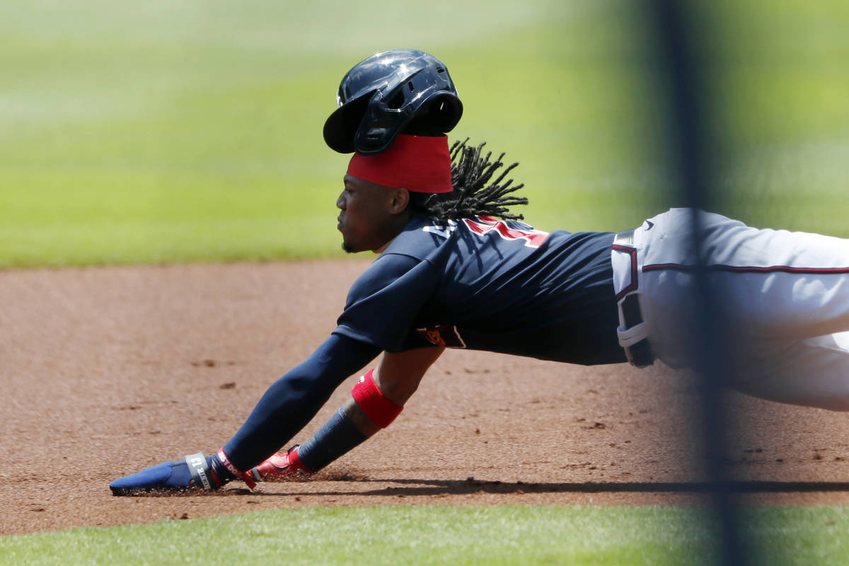 Atlanta Braves center fielder Ronald Acuna Jr. (13) steals second base during an intrasquad bas ...