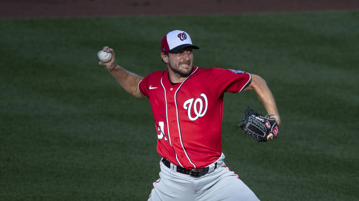 Washington Nationals starting pitcher Max Scherzer (31) throws during a baseball training camp ...
