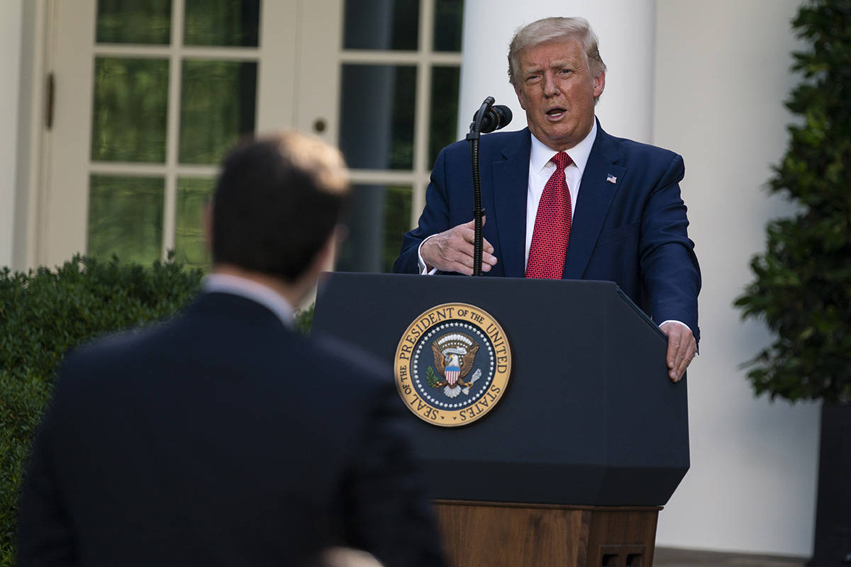 President Donald Trump speaks during a news conference in the Rose Garden of the White House, T ...