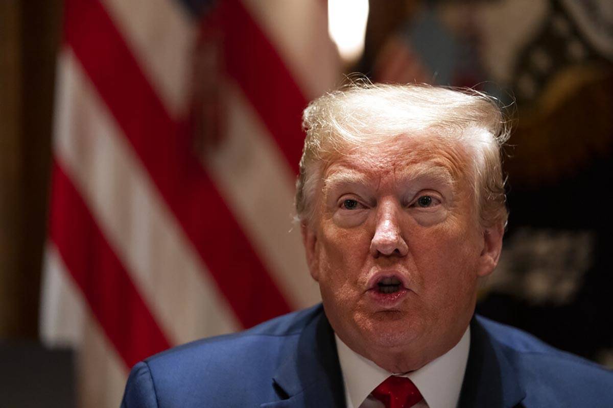 President Donald Trump speaks during a news conference in the Rose Garden of the White House, T ...