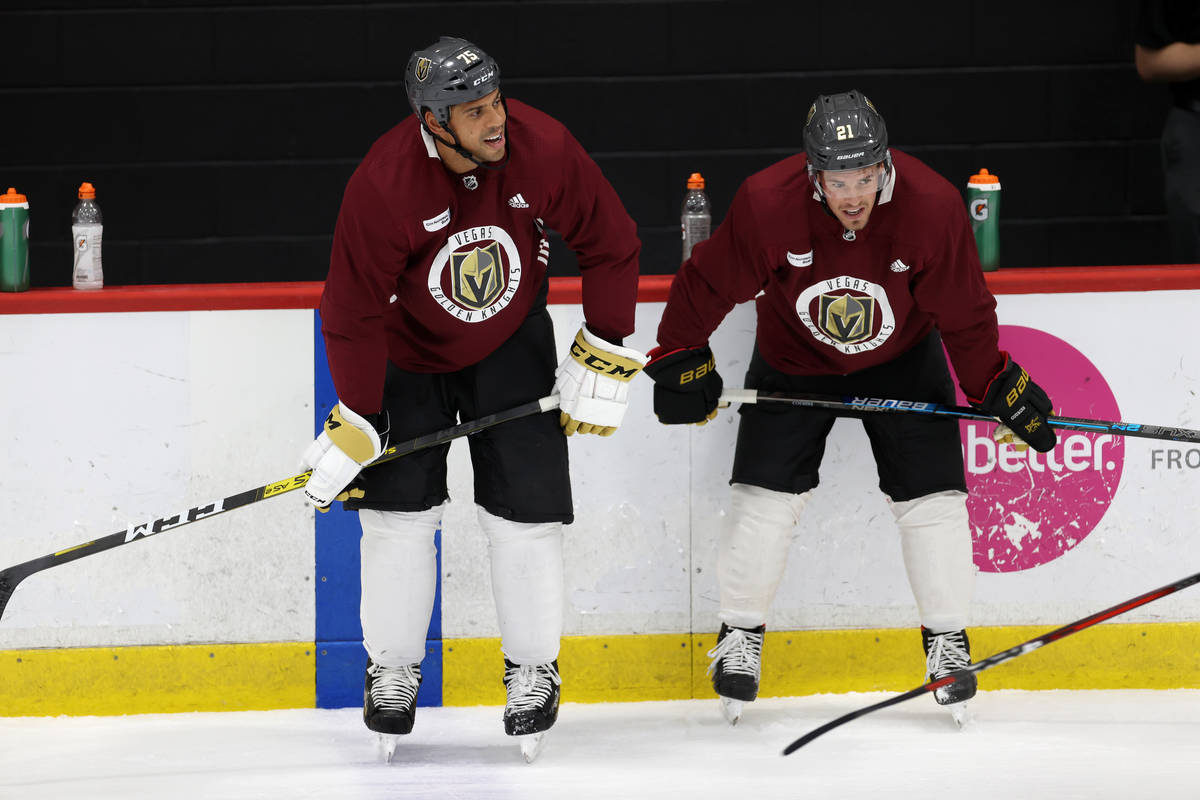 Vegas Golden Knights right wing Ryan Reaves (75), left, and center Nick Cousins (21) during a t ...