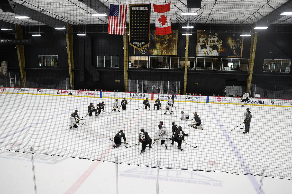Vegas Golden Knights players stretch during a team practice at City National Arena in Las Vegas ...